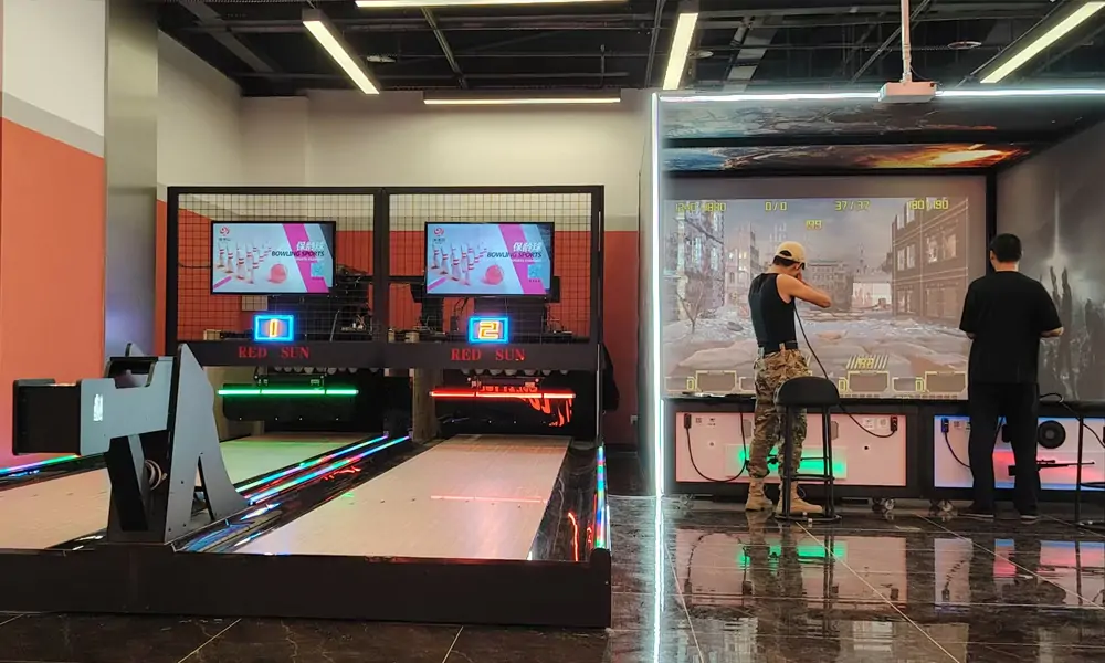 duckpin bowling and a virtual reality shooting game